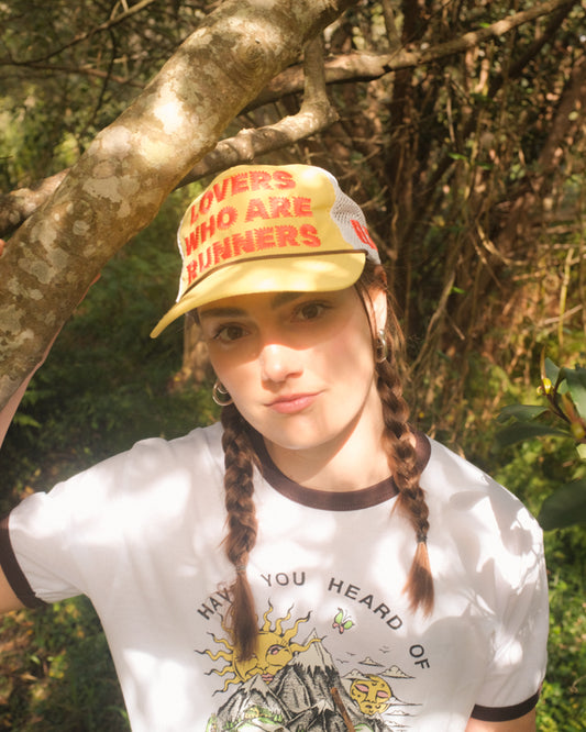 "LOVERS WHO ARE RUNNERS" Trucker Hat